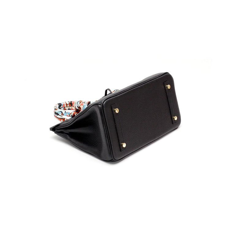 Women's Leather Handbag with Multiple Pockets and Twist Lock Closure