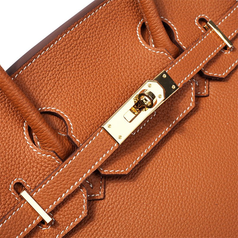 Women's Leather Handbag with Multiple Pockets and Twist Lock Closure