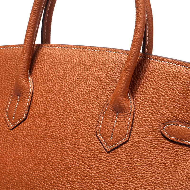 Women's Leather Handbag with Multiple Pockets and Twist Lock Closure