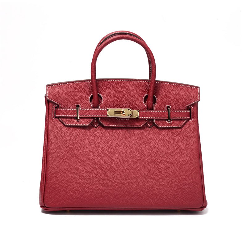 Women's Leather Handbag with Multiple Pockets and Twist Lock Closure
