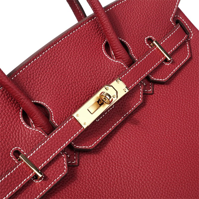 Women's Leather Handbag with Multiple Pockets and Twist Lock Closure