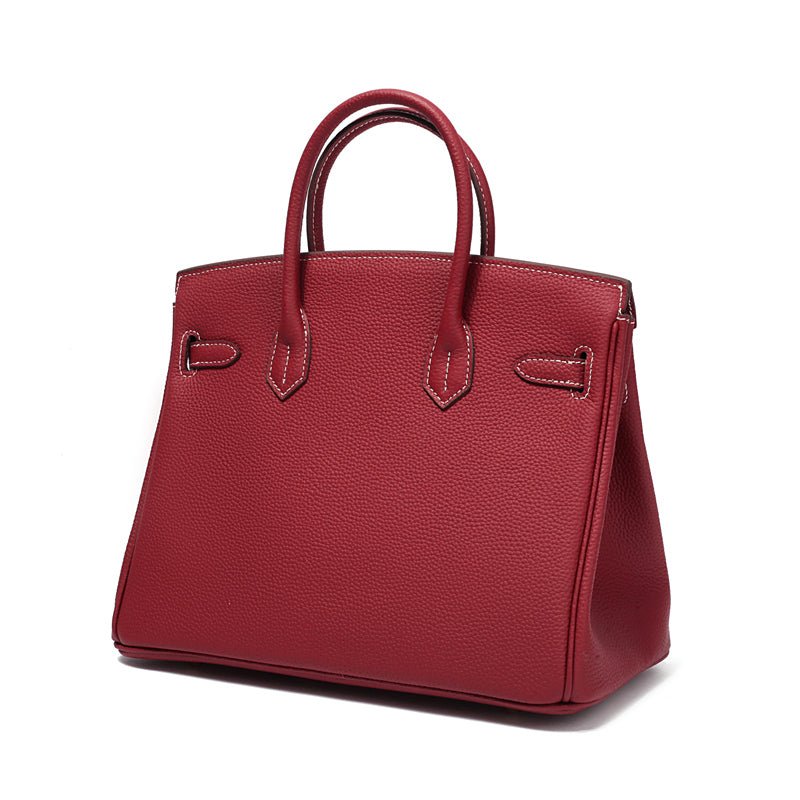 Women's Leather Handbag with Multiple Pockets and Twist Lock Closure