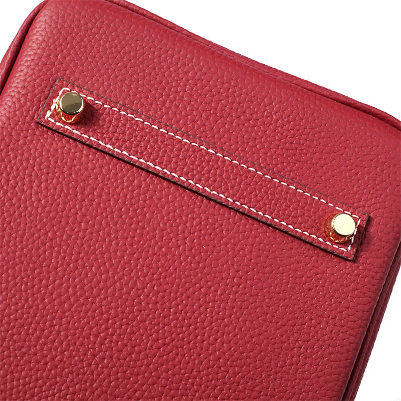 Women's Leather Handbag with Multiple Pockets and Twist Lock Closure