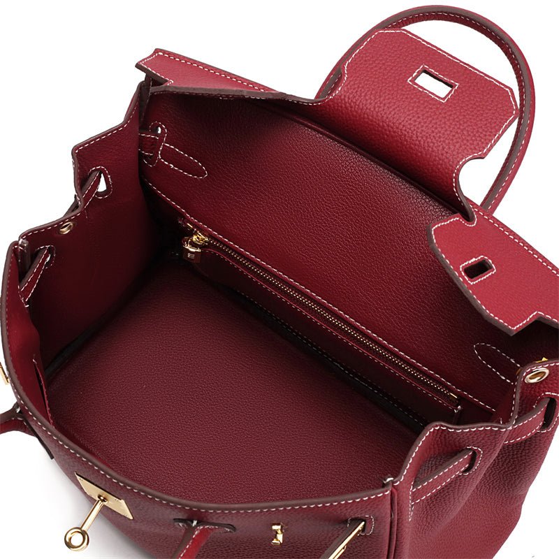 Women's Leather Handbag with Multiple Pockets and Twist Lock Closure