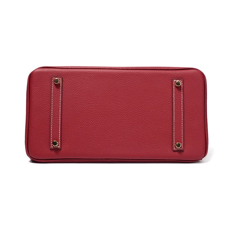 Women's Leather Handbag with Multiple Pockets and Twist Lock Closure