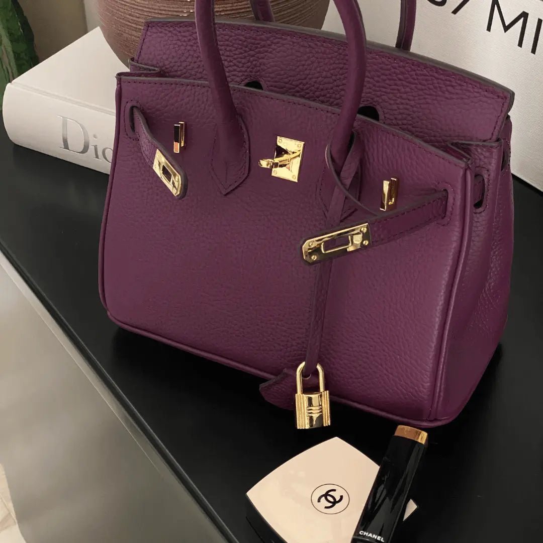 Women's Leather Handbag with Multiple Pockets and Twist Lock Closure