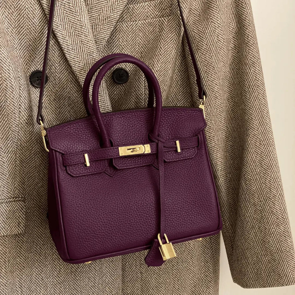 Women's Leather Handbag with Multiple Pockets and Twist Lock Closure
