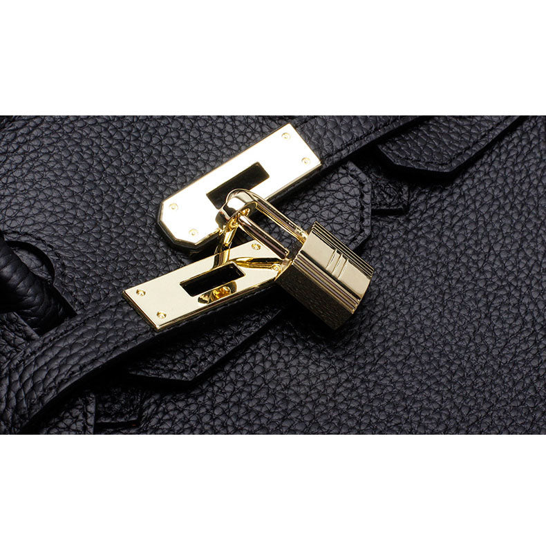 Women's Leather Handbag with Multiple Pockets and Twist Lock Closure