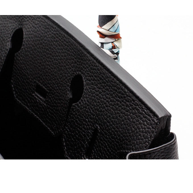 Women's Leather Handbag with Multiple Pockets and Twist Lock Closure