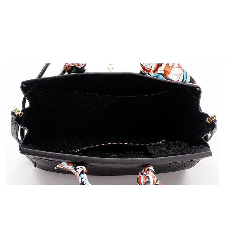 Women's Leather Handbag with Multiple Pockets and Twist Lock Closure