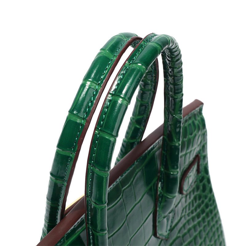 Women's Leather Handbag with Multiple Pockets and Twist Lock Closure